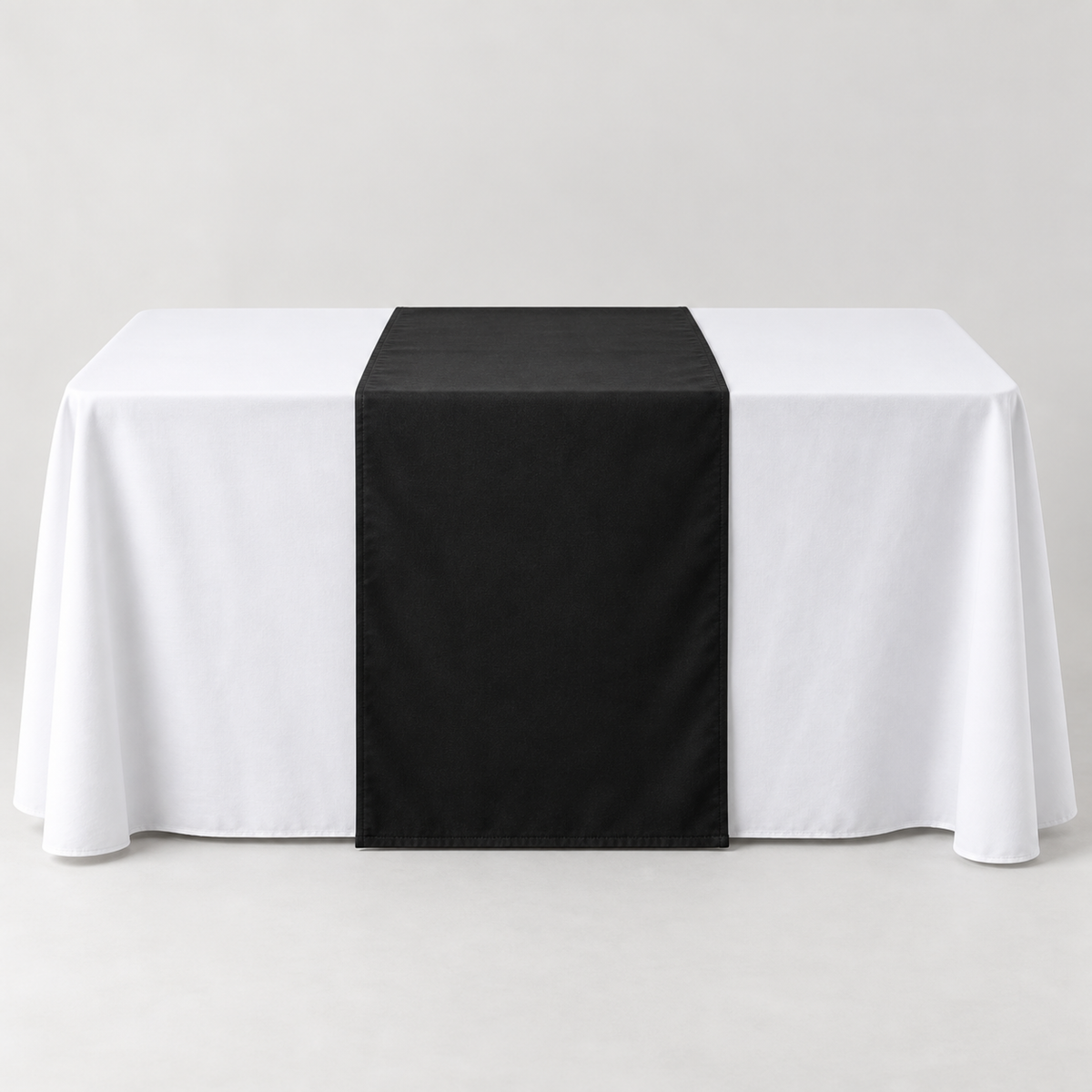 Blank Jet Black 30 × 60 inch table runner displayed over a white event table