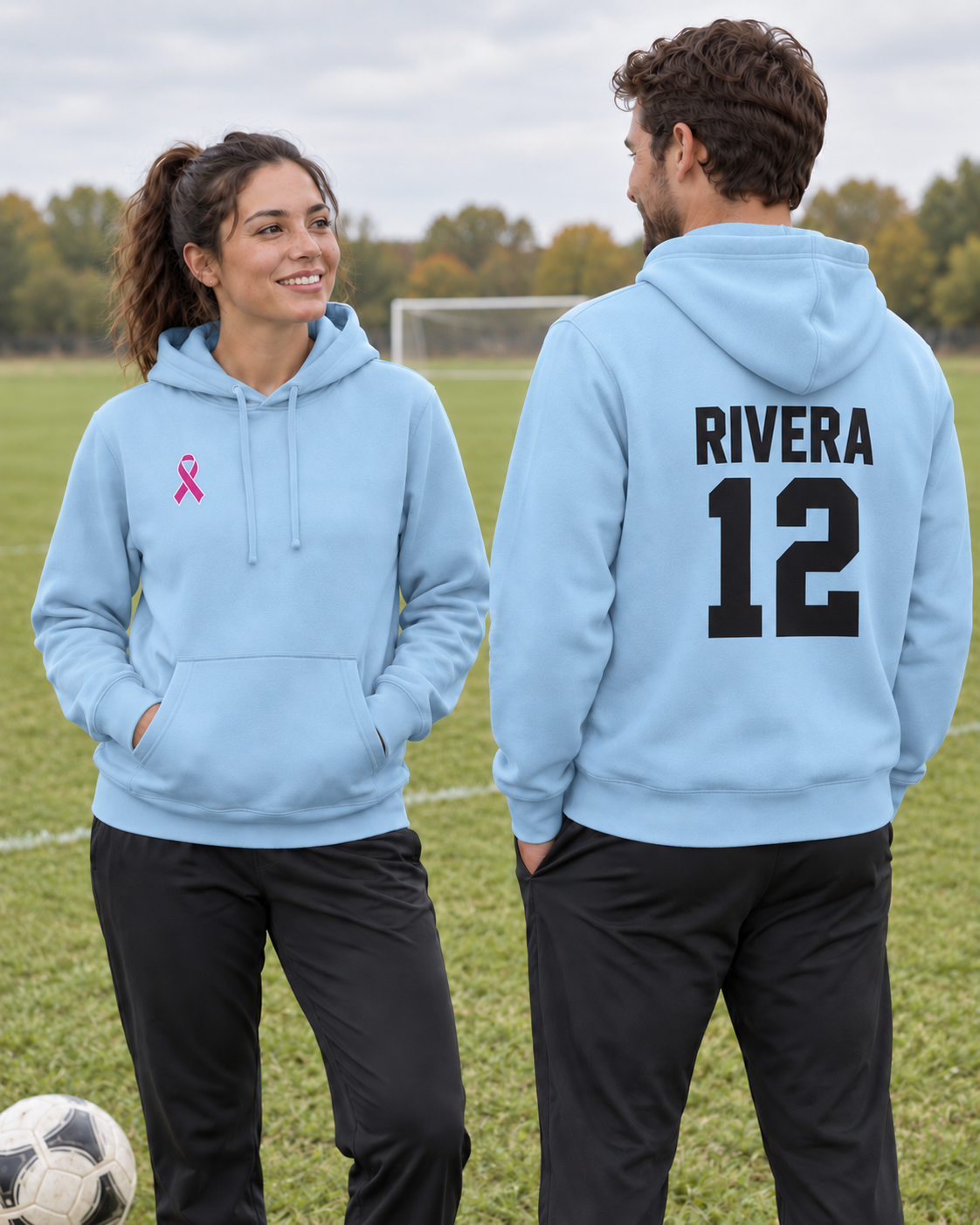Custom Fleece Hoodie — Ice Blue — soccer campaign, pink front ribbon and RIVERA 12 athletic back print