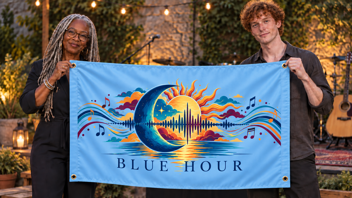 Columbia Blue customized 5 ft x 3 ft flag at a music event, with colorful original artwork, people, four corner grommets and matching stitched side bands