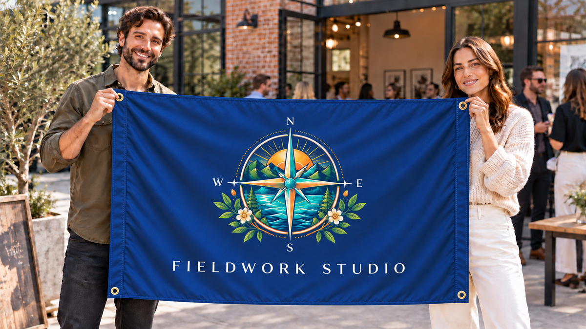 Navy customized 5 ft x 3 ft flag at a business event, with colorful original artwork, people, four corner grommets and matching stitched side bands
