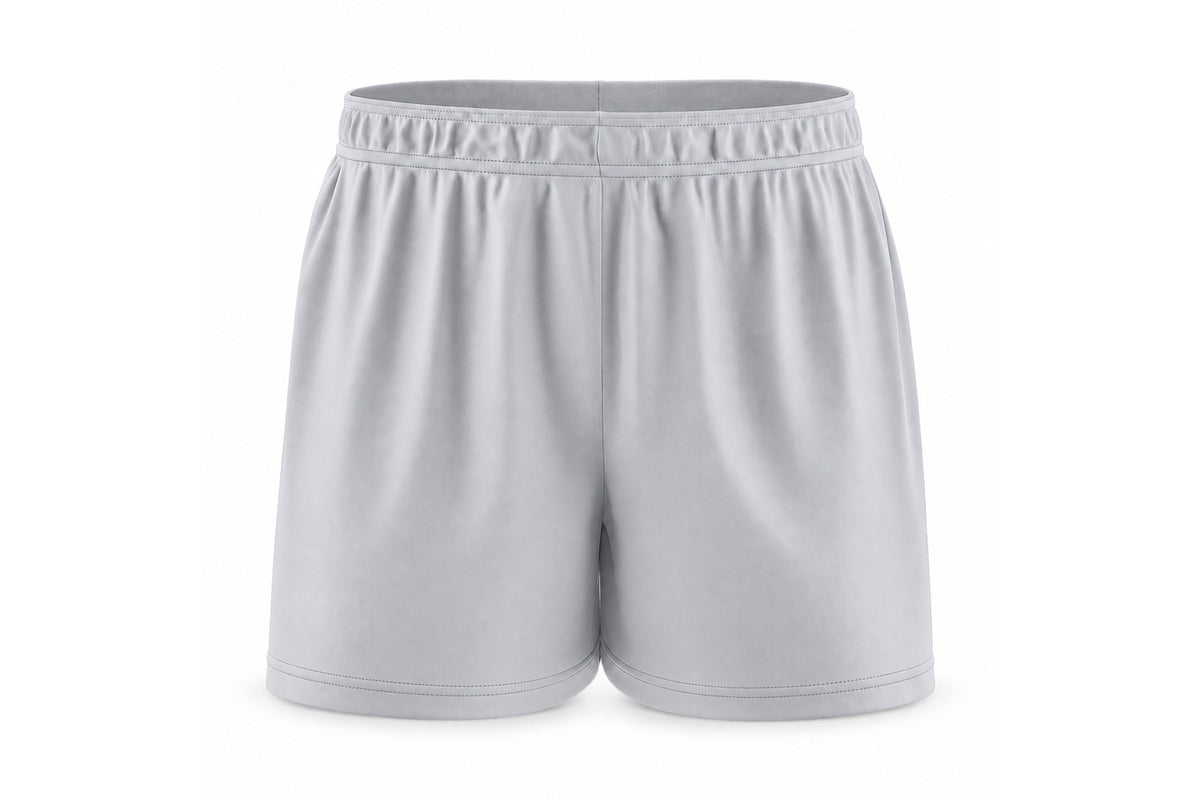 Front view of blank silver gray custom sublimated athletic shorts with elastic waistband and stitched hems on a white background.