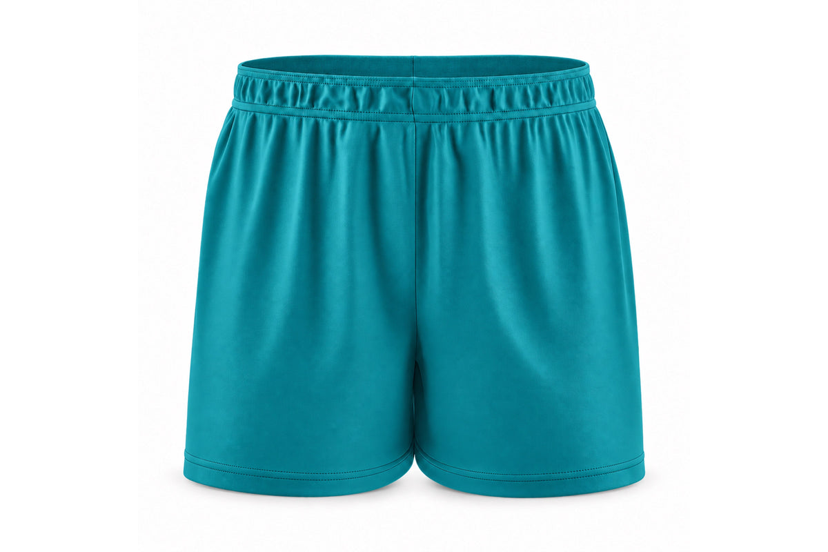 Front view of blank teal custom sublimated athletic shorts with elastic waistband and stitched hems on a white background.