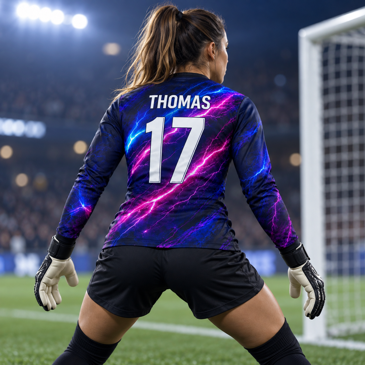 Voltage Strike custom goalkeeper jersey worn by female goalkeeper in ready stance, back view, THOMAS 17