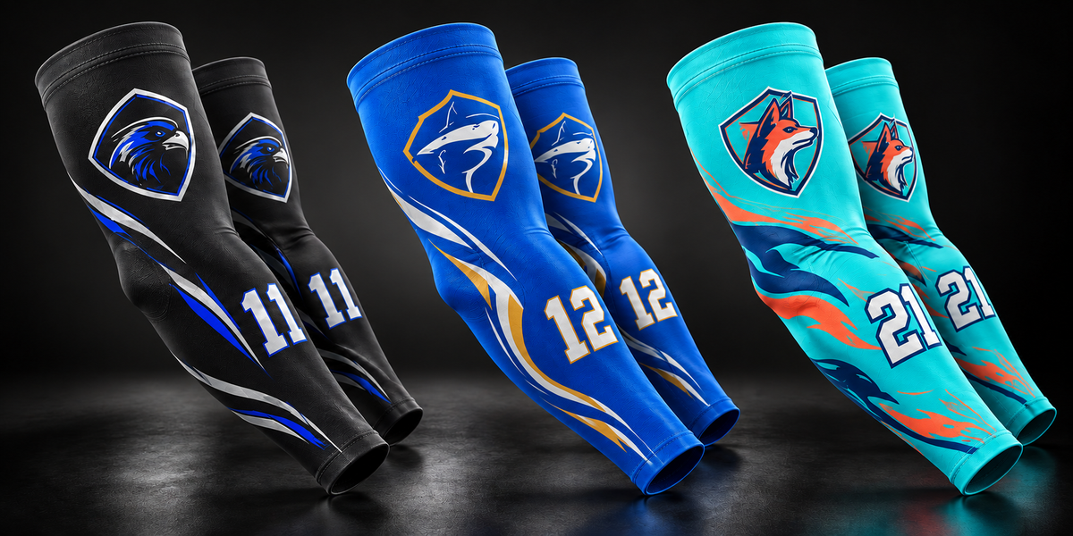 Three pairs of custom arm sleeves in black, royal blue, and turquoise with team crests and player numbers against a rich black gradient.