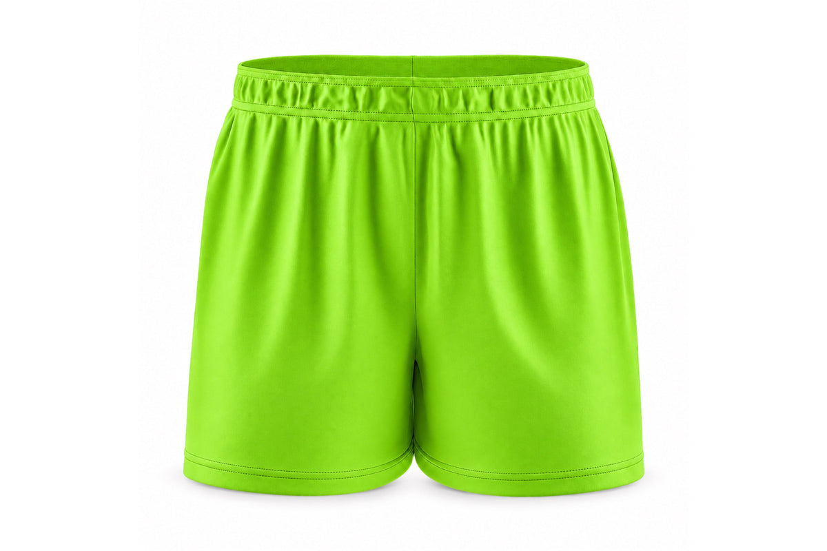 Front view of blank lime green custom sublimated athletic shorts with elastic waistband and stitched hems on a white background.