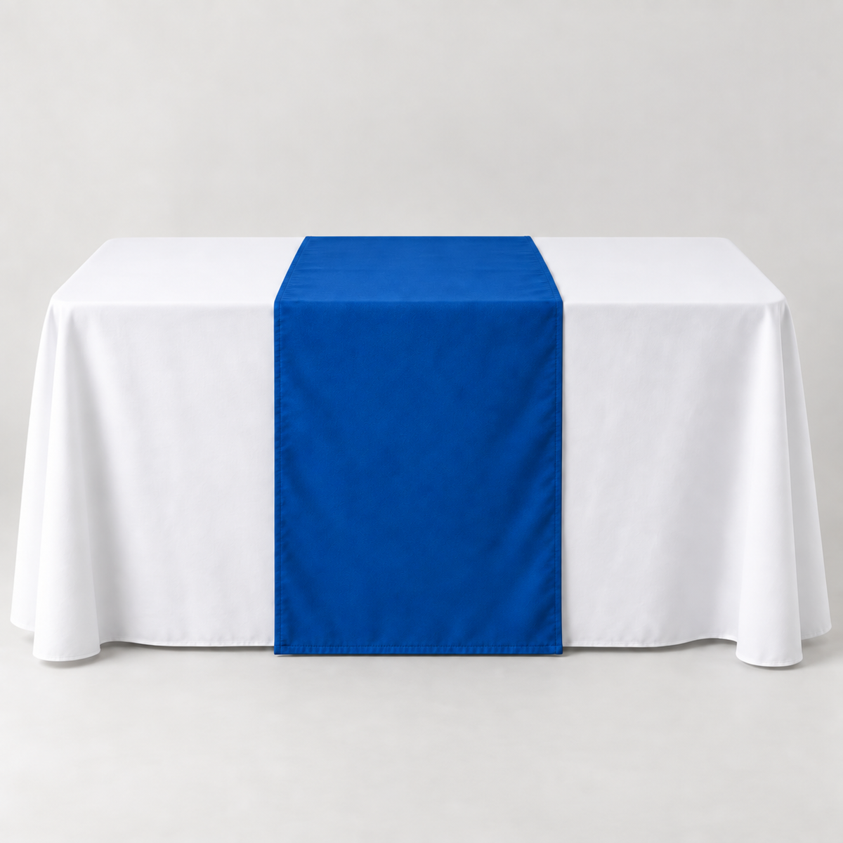 Blank Athletic Royal 30 × 60 inch table runner displayed over a white event table