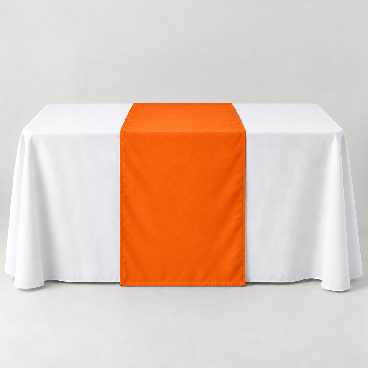 Blank Sport Orange 30 × 60 inch table runner displayed over a white event table