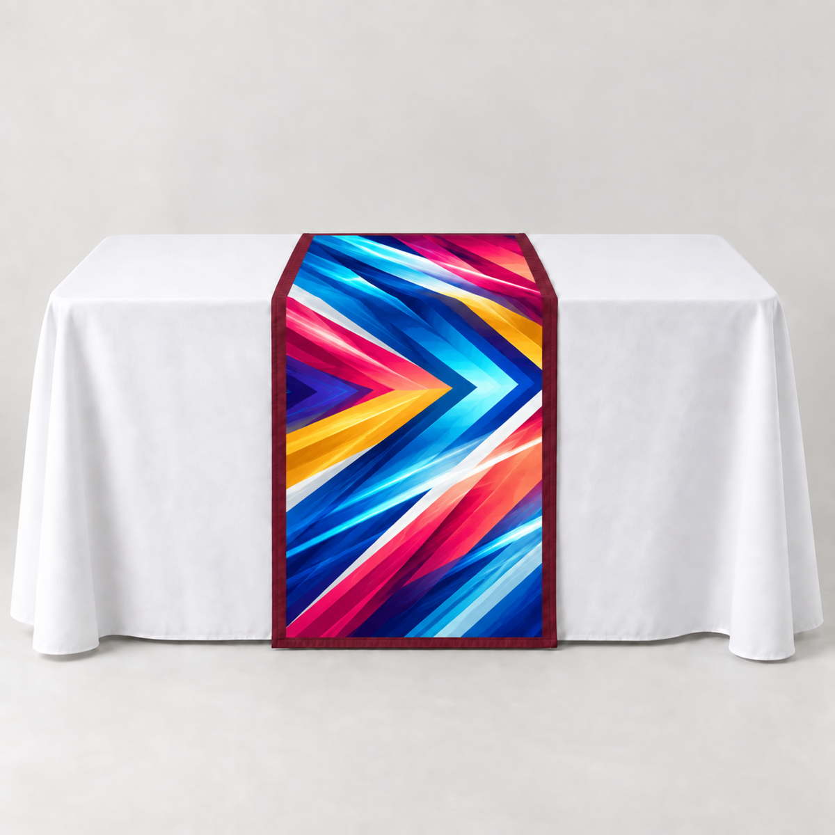 Team Maroon 30 × 60 inch table runner with a vibrant geometric custom-print example