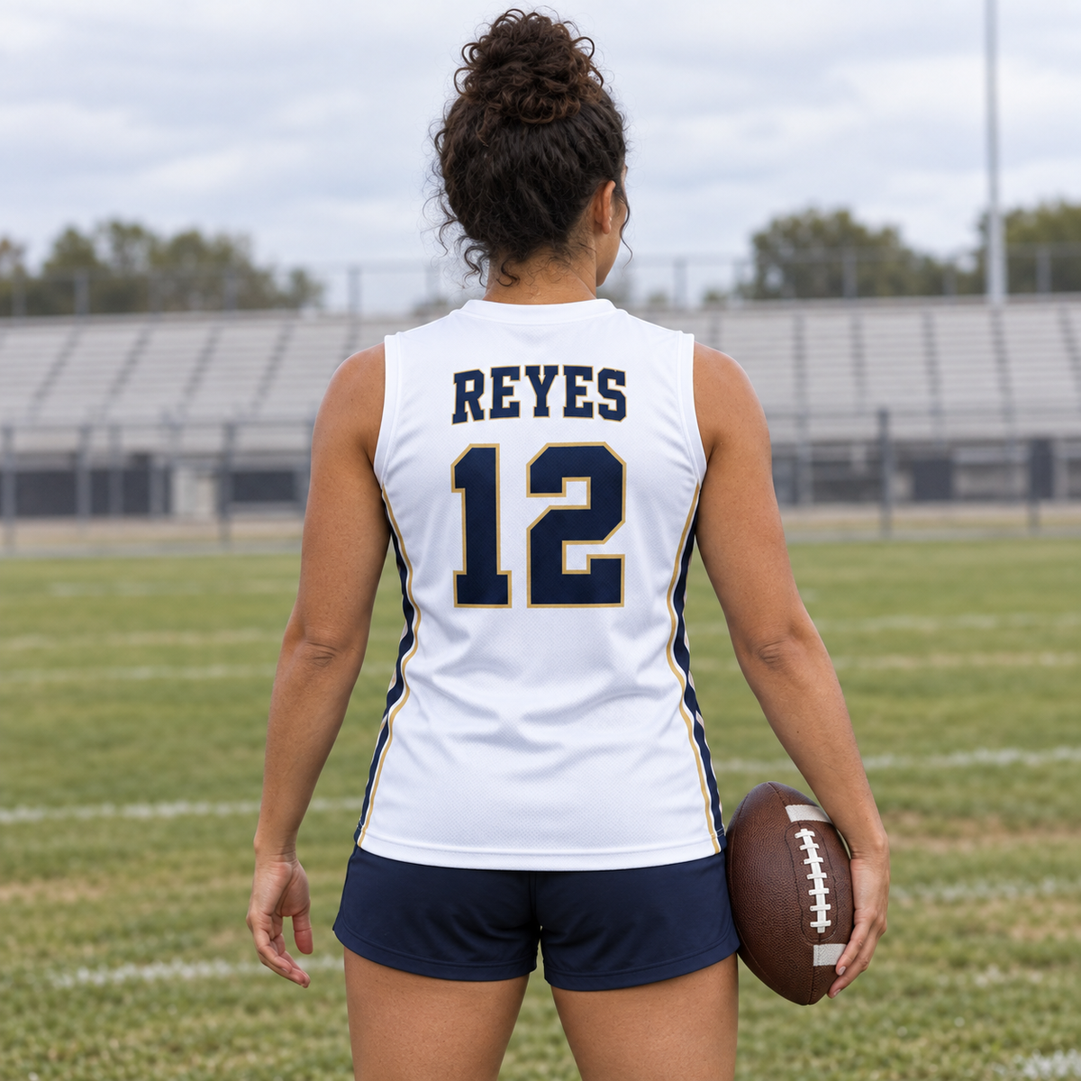 White custom 7-on-7 football jersey on a woman, back campaign view with REYES and number 12; AI-generated customization example