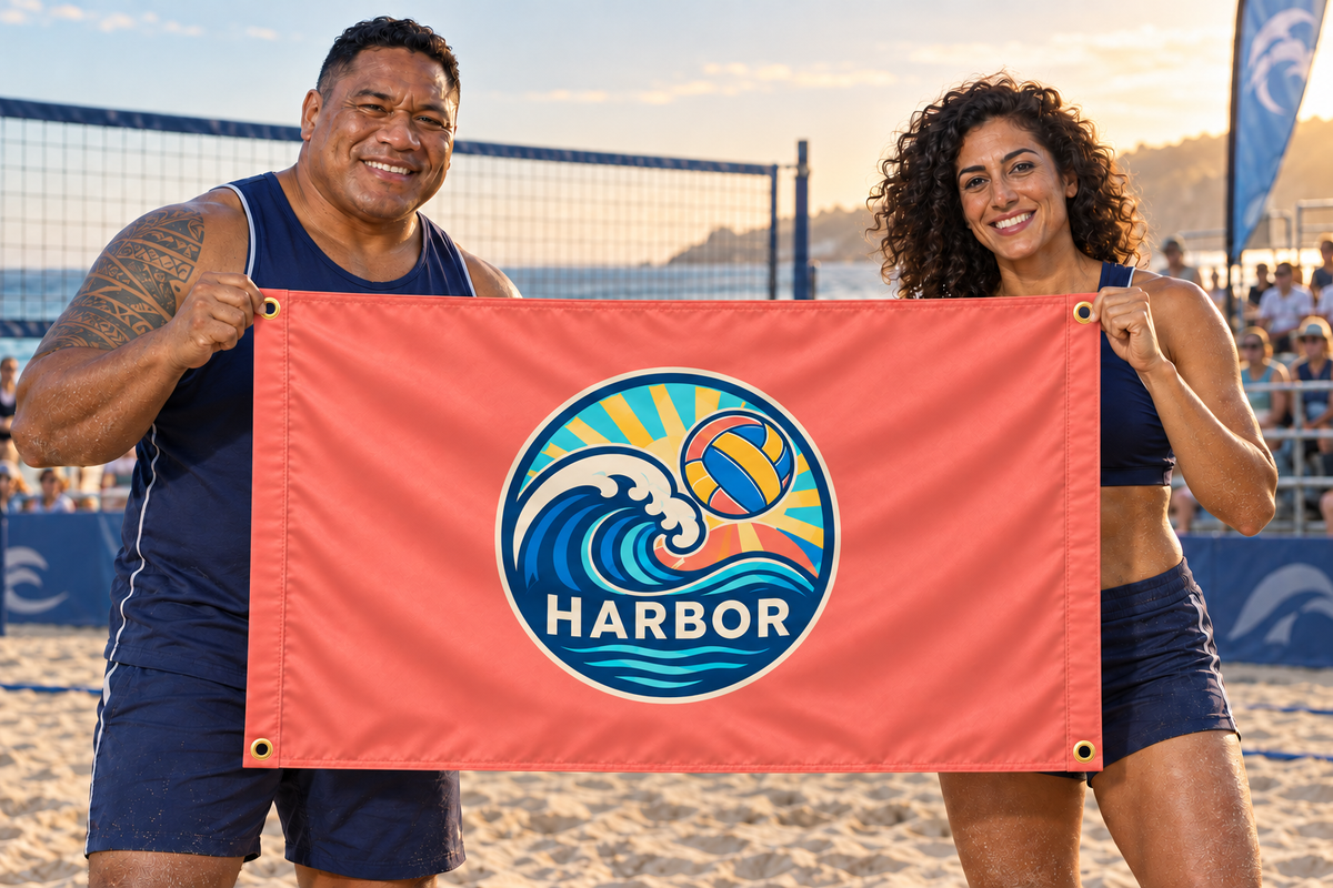 Illustrative campaign: adult beach volleyball players holding a customized coral flag, 5 feet wide by 3 feet tall with a vivid multicolor ocean crest and four corner grommets