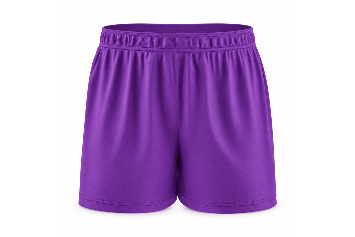 Front view of blank purple custom sublimated athletic shorts with elastic waistband and stitched hems on a white background.